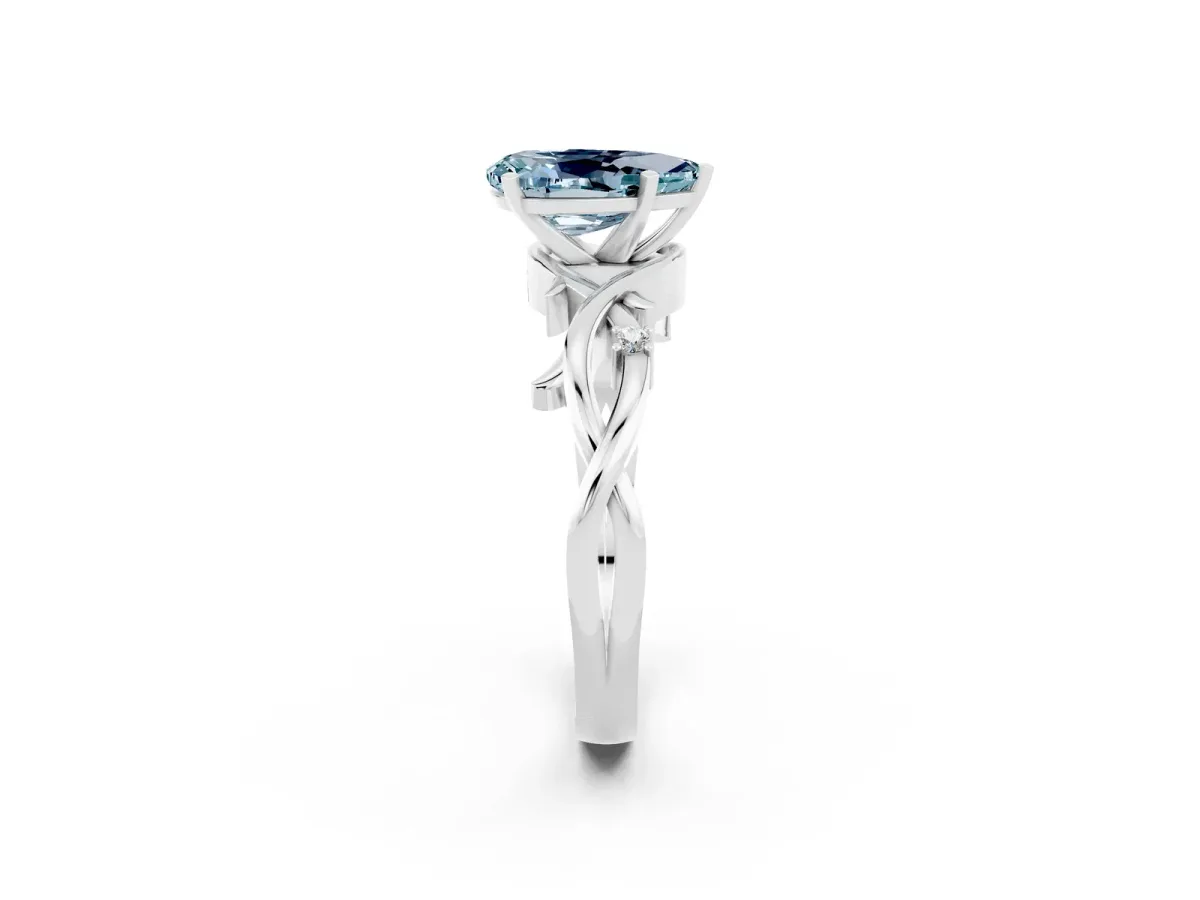Pear Cut Aquamarine Solitaire Ring with Twisted Band and Prong Setting Platinum