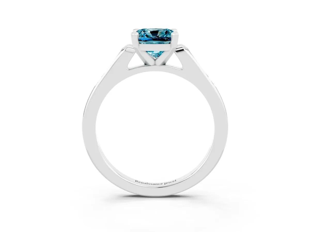 Cushion Cut Blue Topaz Solitaire Ring with Channel Set Round Band and Prong Setting Silver