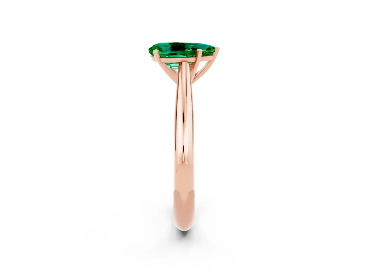 Pear Cut Emerald Solitaire Engagement Ring with Cathedral Setting and Four-Prong Mount Rose gold