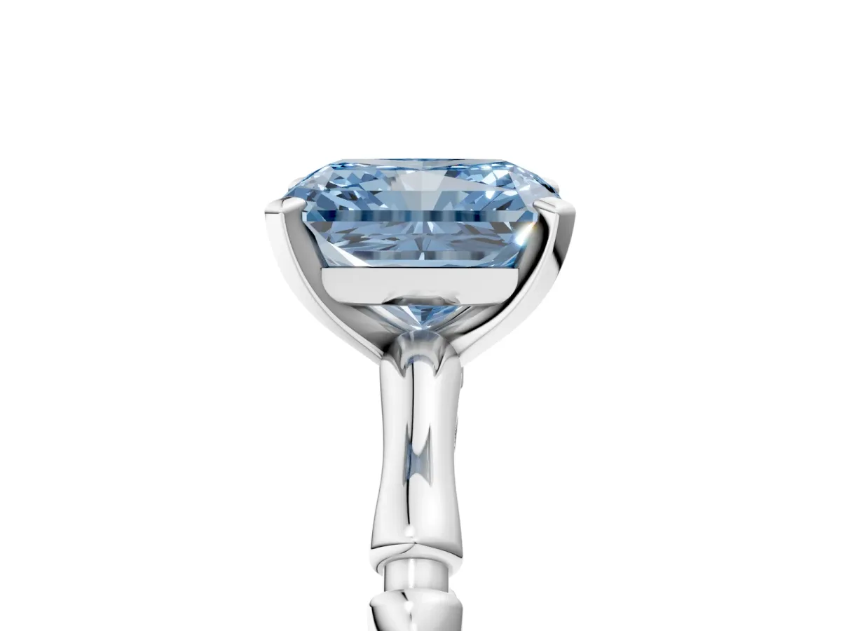 Fancy Blue Radiant Cut Solitaire Diamond Ring with Bamboo Band and Four-Prong Setting Platinum