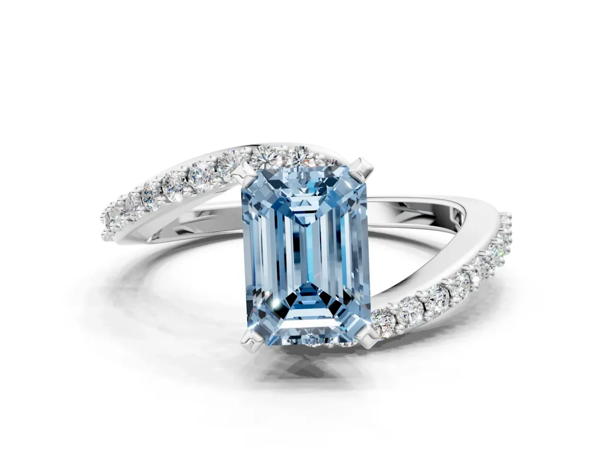Fancy Blue Emerald Cut Solitaire Twist Band with Pave Set Diamonds and Four-Prong Setting Platinum