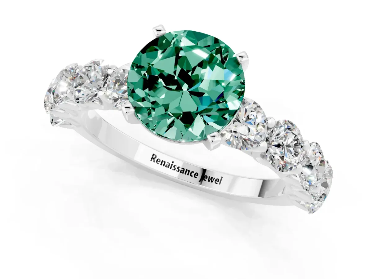 Round Cut Green Sapphire Prong Setting with Side Stones on a Pave Band Silver