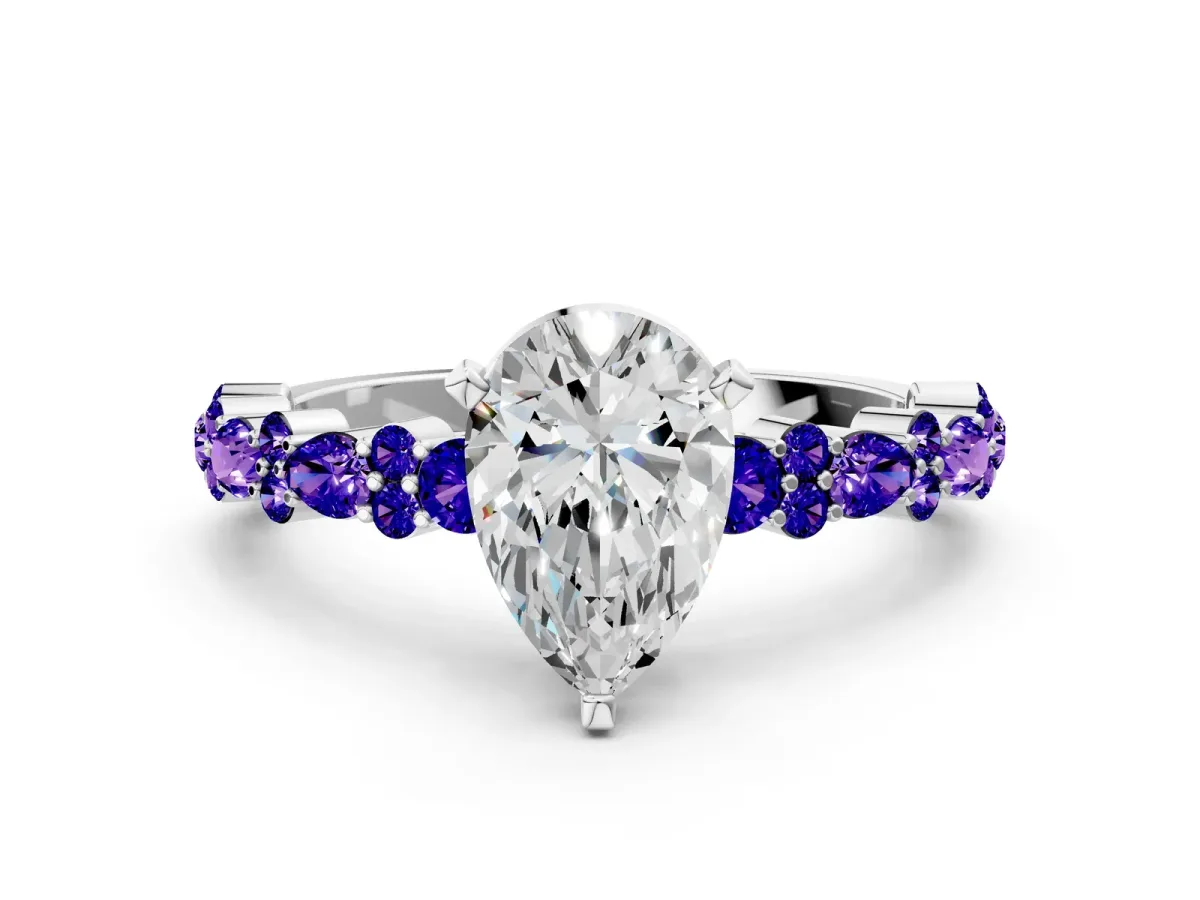 Pear Cut Diamond Side Stone Solitaire Ring with Round Tanzanite and Four-Prong Setting Silver
