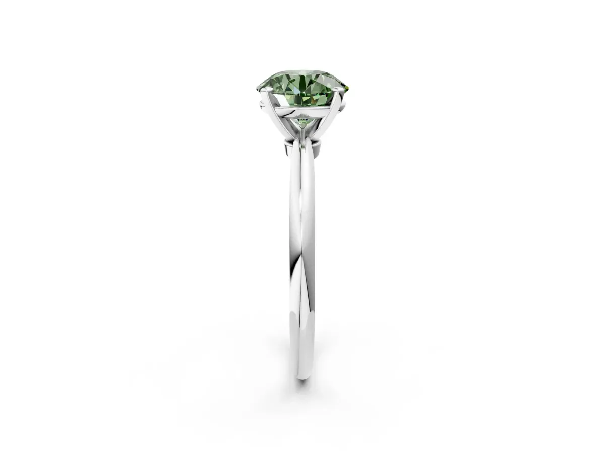 Fancy Green Round Cut Diamond Solitaire Ring with Six-Prong Setting and Classic Band Silver