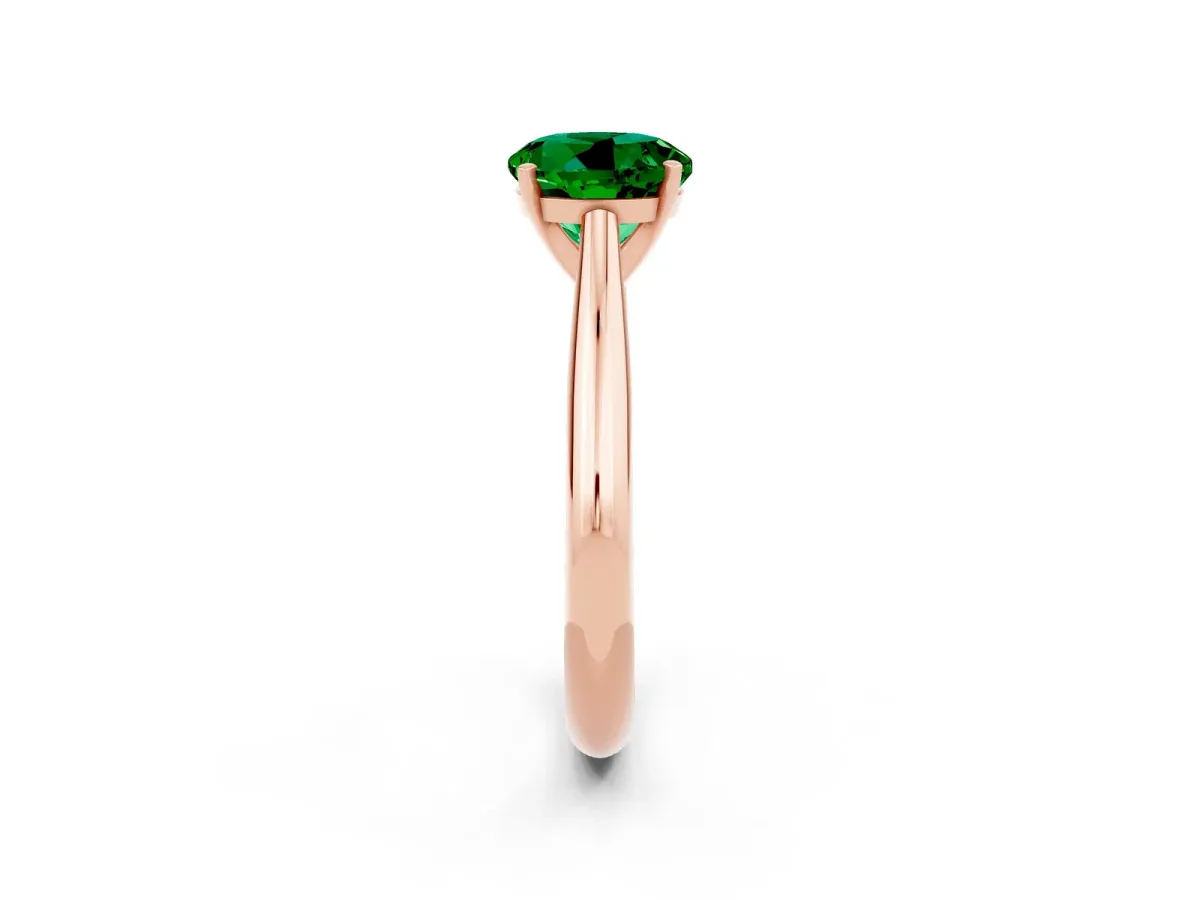 Round Cut Emerald Solitaire Engagement Ring with Cathedral Setting and Four-Prong Mount Rose gold
