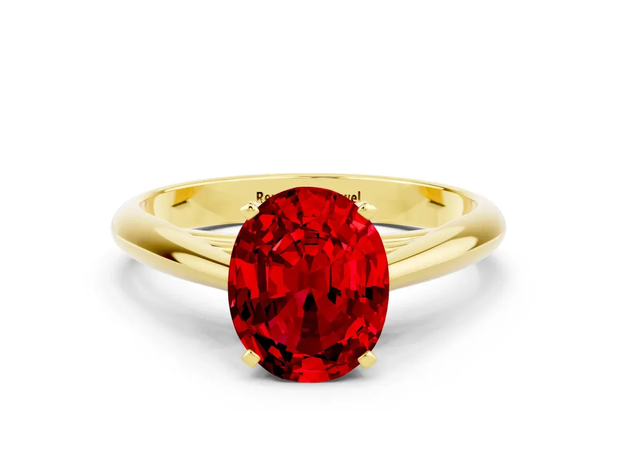 Oval Cut Ruby Solitaire Engagement Ring with Cathedral Setting and Four-Prong Mount Yellow gold