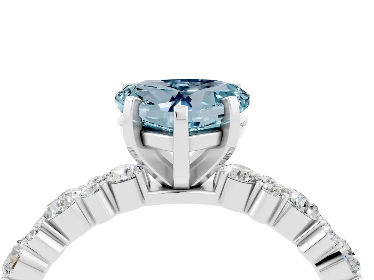 Heart Cut Aquamarine Side Stone Solitaire Ring with Round and Four-Prong Setting Platinum