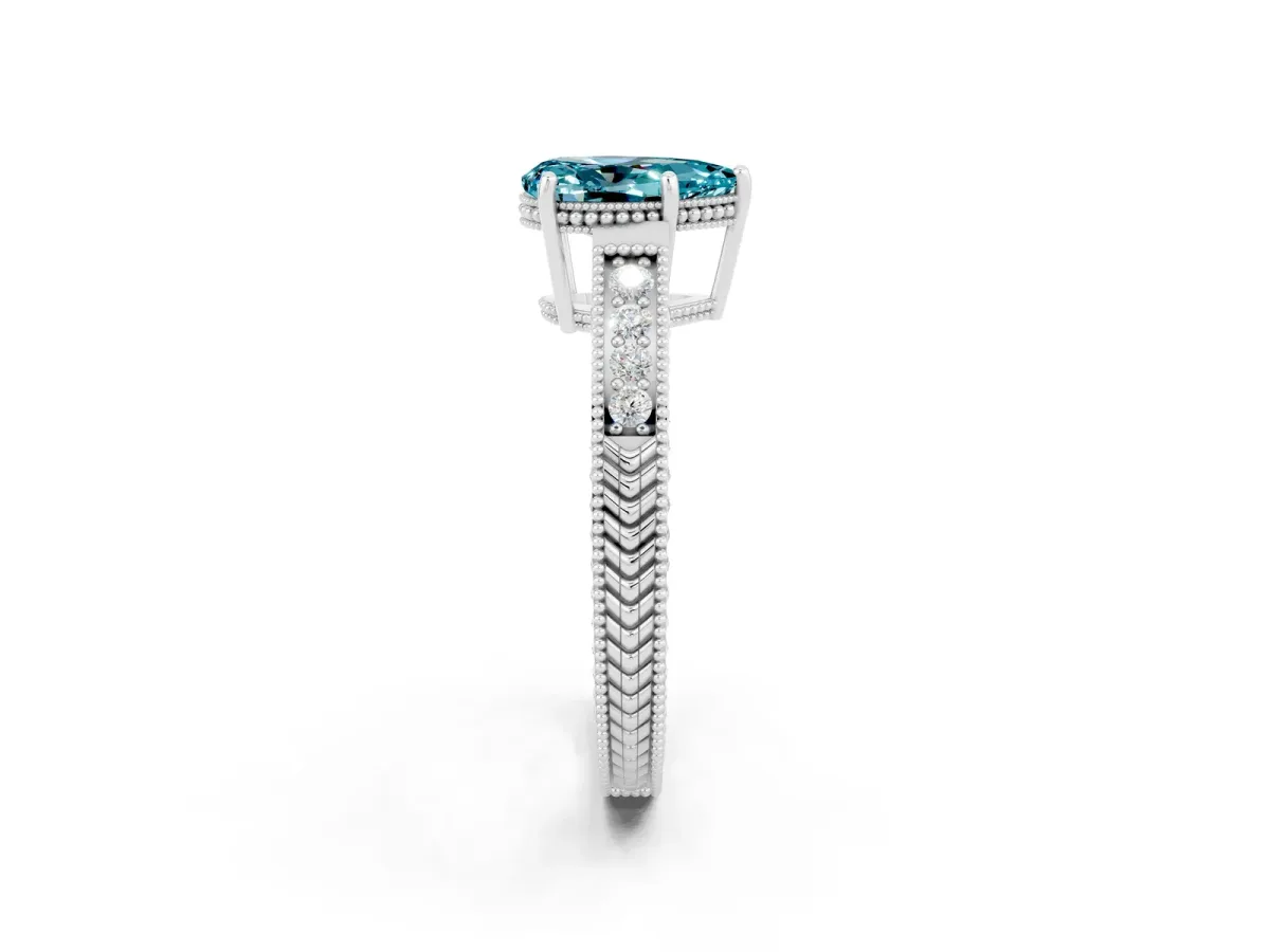 Pear Cut Blue Topaz Ring with Milgrain Pavé Band and Four-Prong Setting Platinum