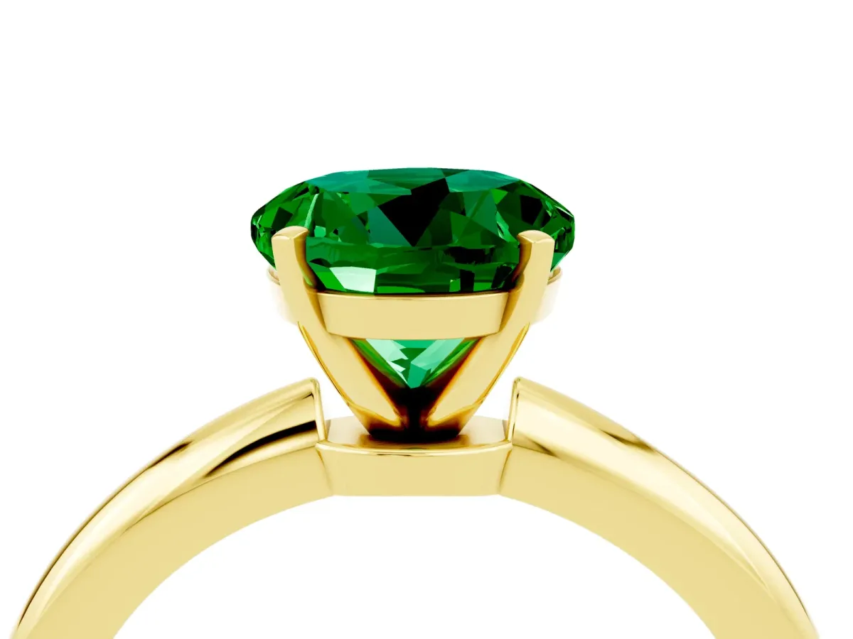 Round Cut Emerald Solitaire Ring with Six-Prong Setting and Classic Band Yellow gold