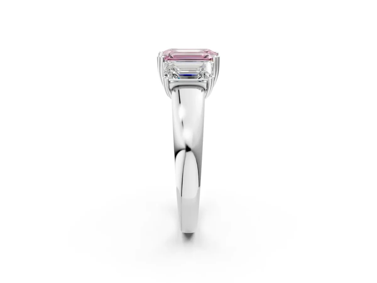 Fancy Pink Three-Stone Emerald Cut Cut Diamond Ring with Channel Set Band and Four-Prong Setting Silver