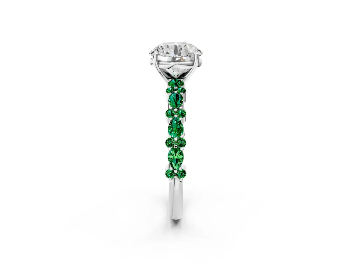 Round Cut Diamond Side Stone Solitaire Ring with Round Emerald and Four-Prong Setting White gold