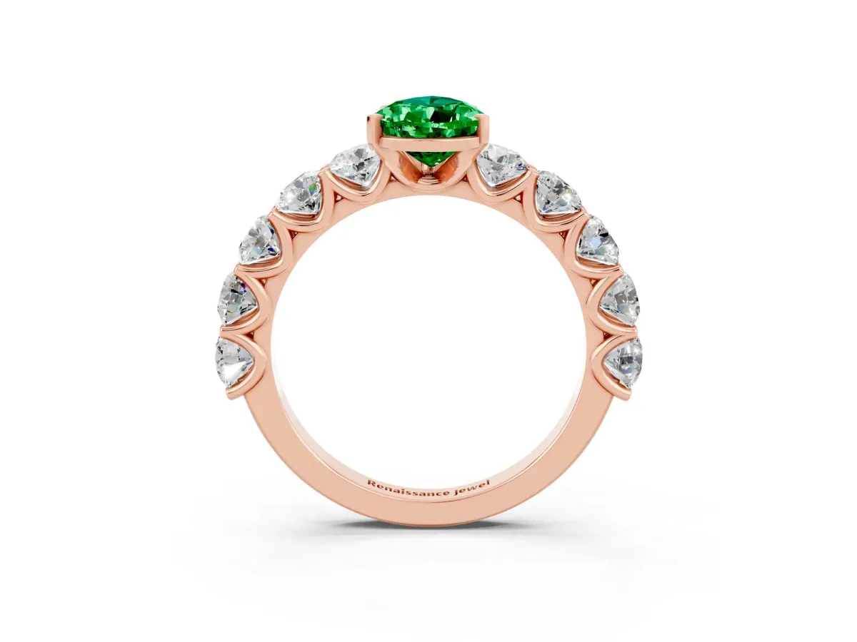 Pear Cut Emerald Prong Setting with Side Stones on a Pave Band Rose gold