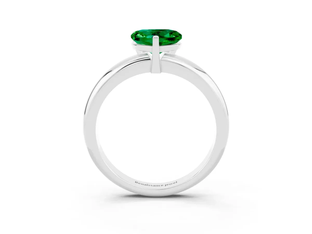 Heart Cut Emerald Solitaire Engagement Ring with Round Band and Four-Prong Setting Silver