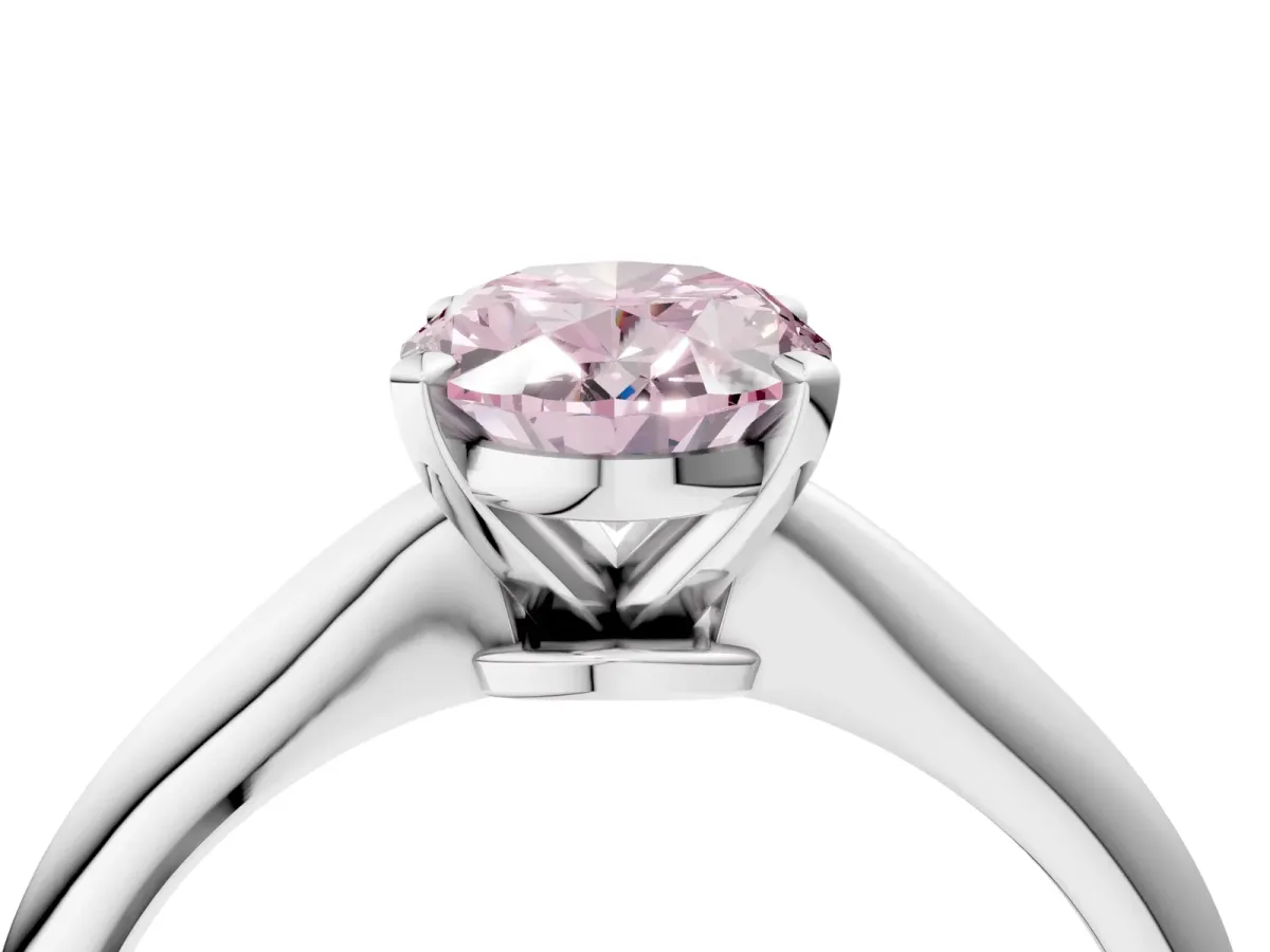 Fancy Pink Oval Cut Diamond Solitaire Engagement Ring with Classic Band and Four-Prong Setting Silver