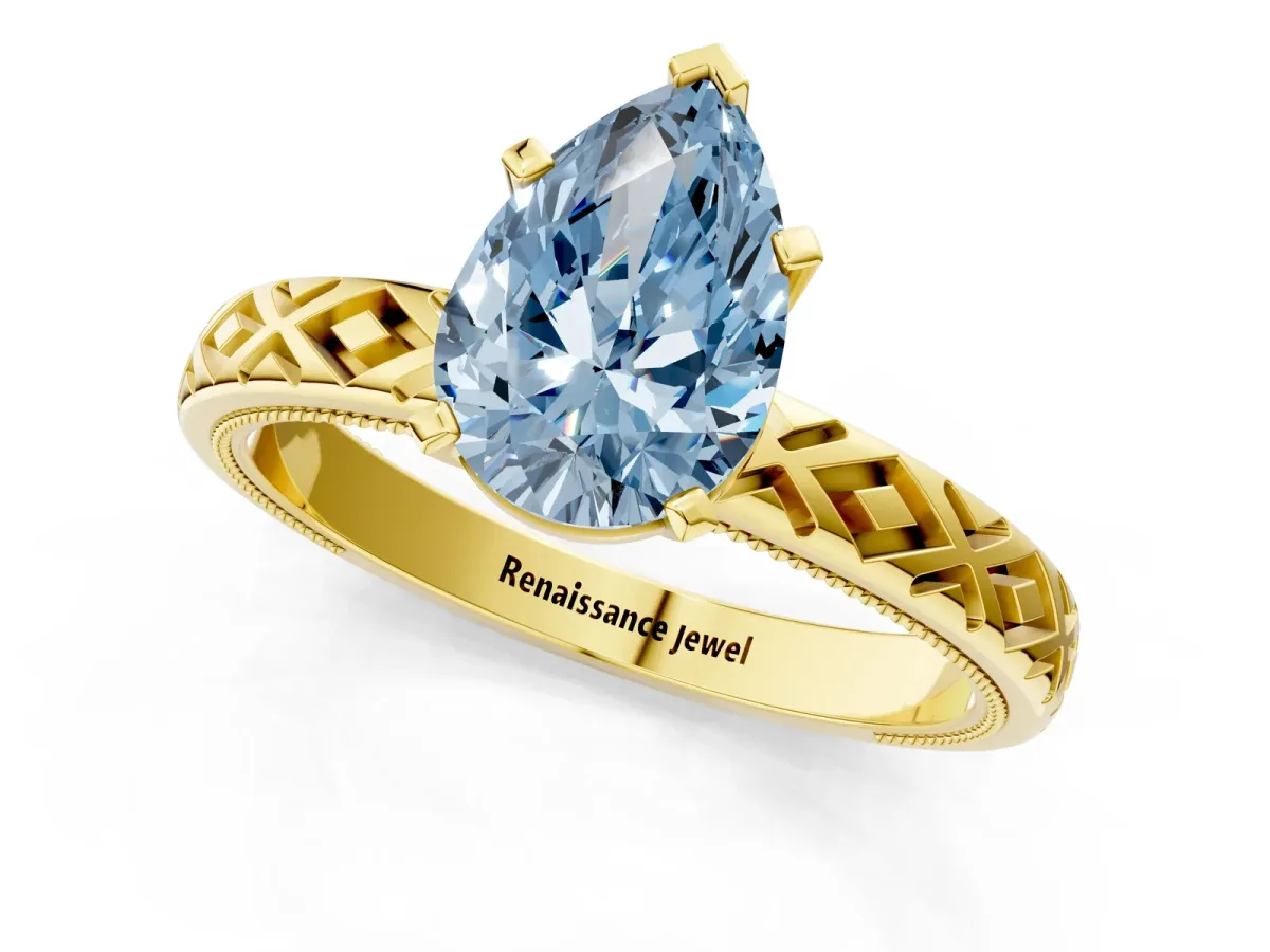 Fancy Blue Pear Cut Solitaire Diamond Ring with Milgrain and Black Enamel X Pattern Band Yellow gold