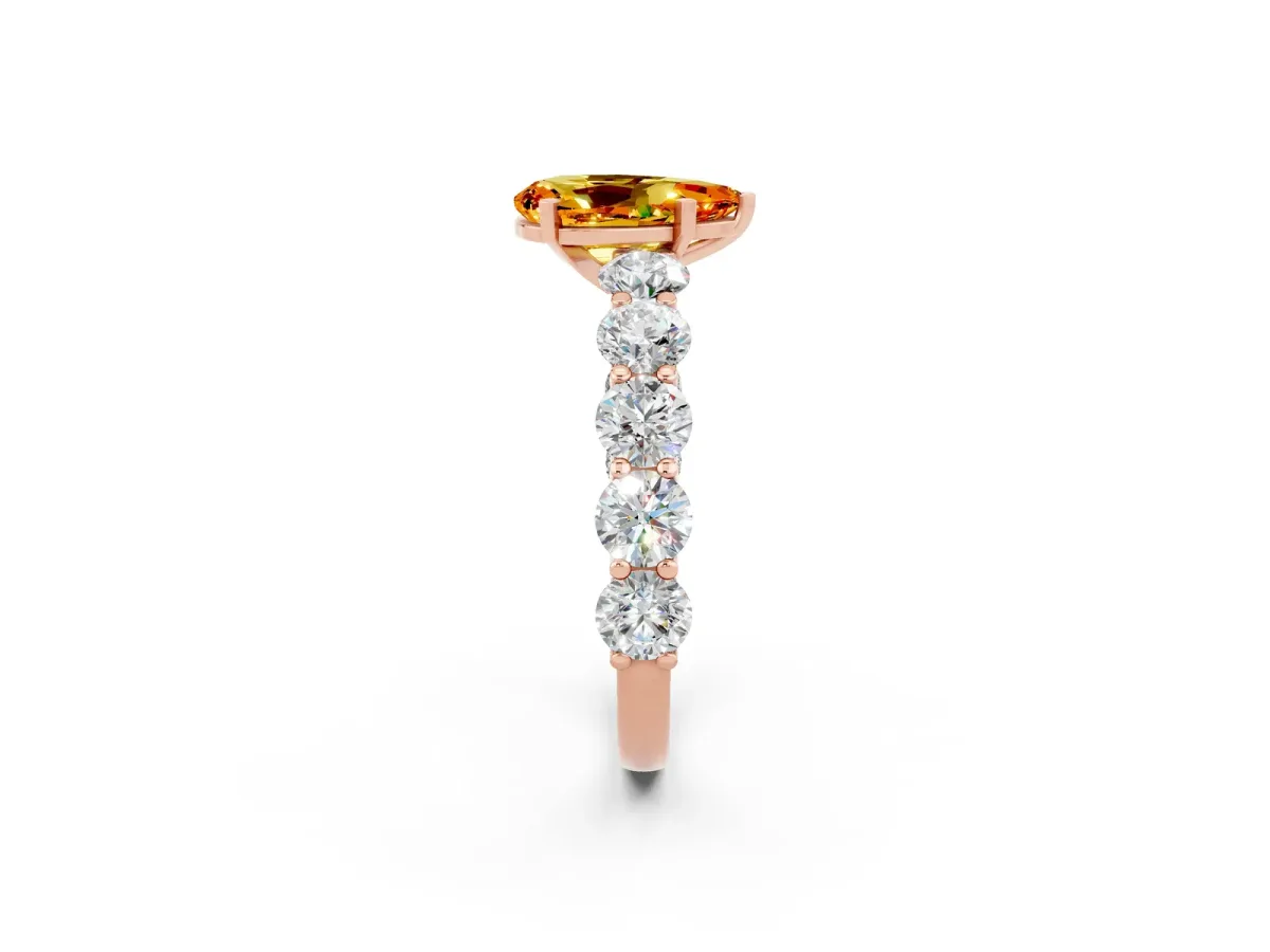 Pear Cut Citrine Prong Setting with Side Stones on a Pave Band Rose gold