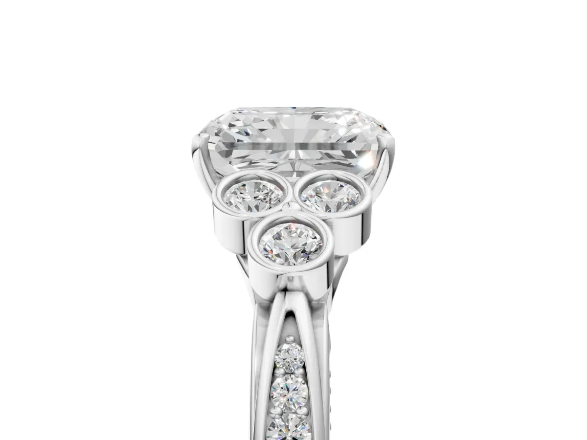 Radiant Cut Cut Diamond Engagement Ring with Bezel Set Round Side Stones and Prong Setting Platinum