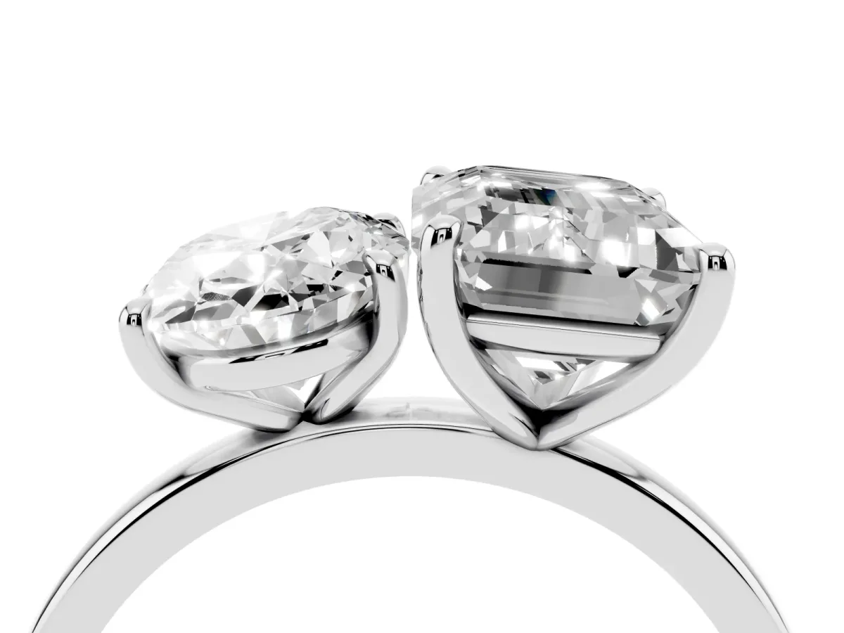 Oval Cut and Emerald Cut Toi Moi Ring with Prong Setting Platinum