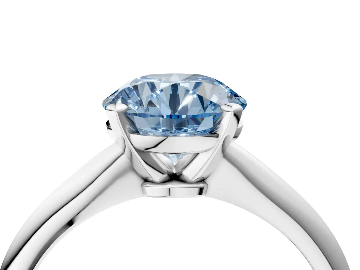 Fancy Blue Round Cut Diamond Solitaire Engagement Ring with Classic Band and Four-Prong Setting Silver
