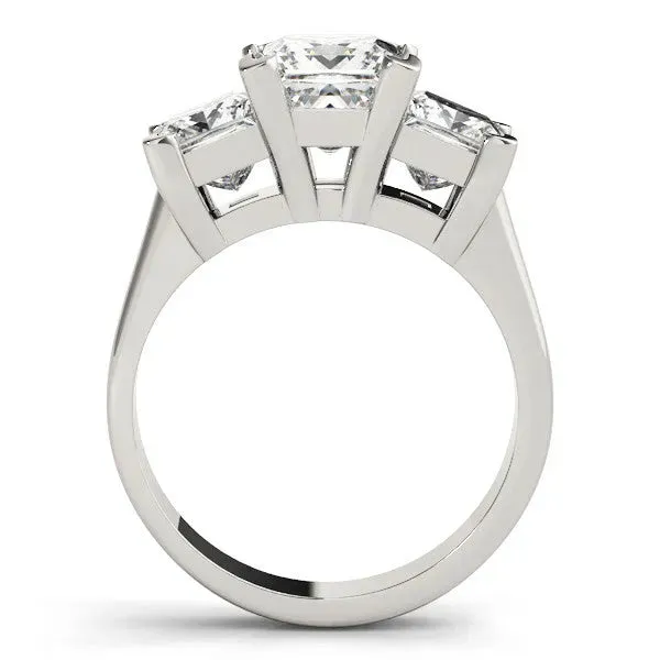 Three-Stone Pear Cut Cut Diamond Ring with Channel Set Band and Four-Prong Setting Platinum
