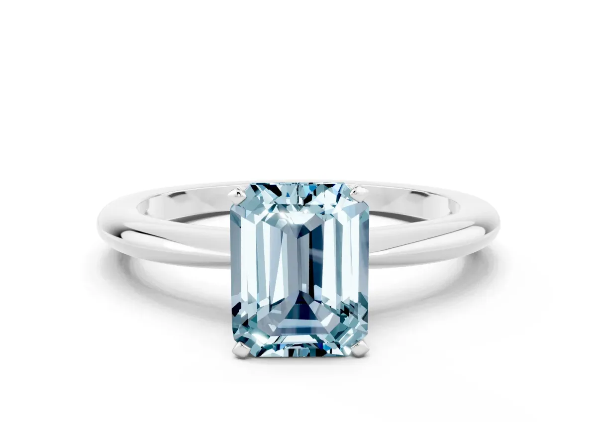 Emerald Cut Aquamarine Solitaire Ring with Six-Prong Setting and Classic Band Silver