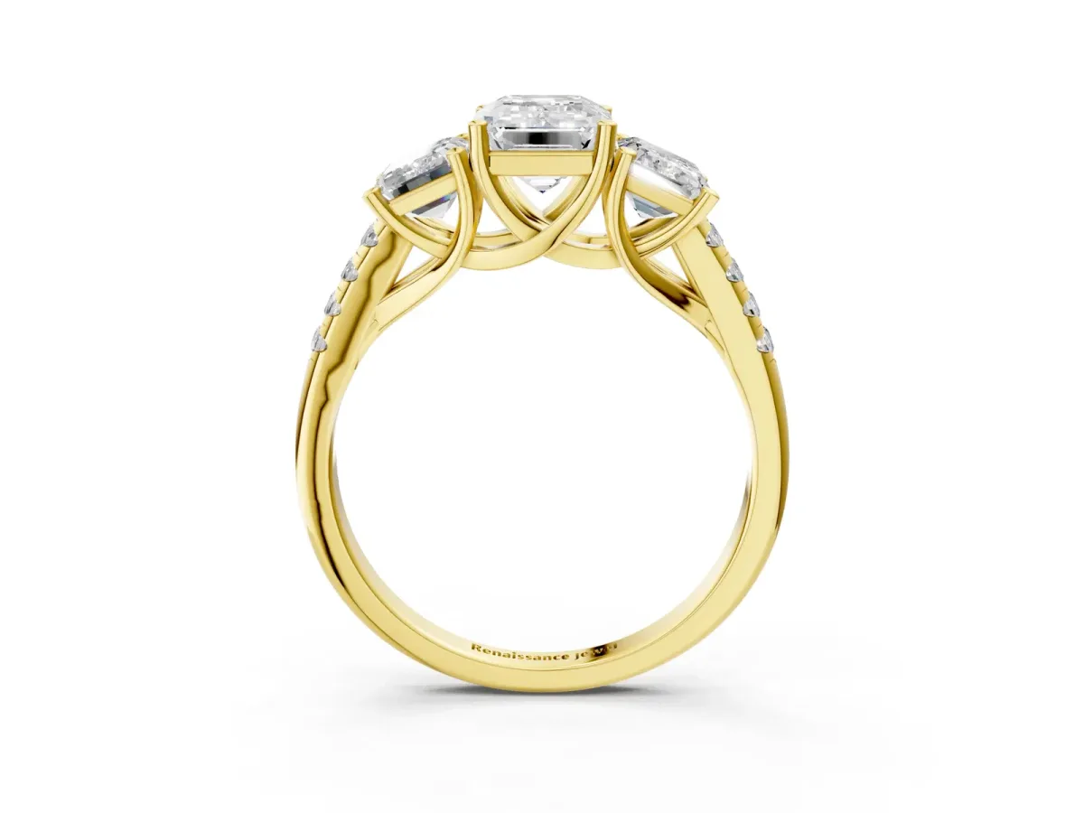 Three-Stone Emerald Cut Diamond Ring with Round Pavé Band and Prong Setting Yellow gold