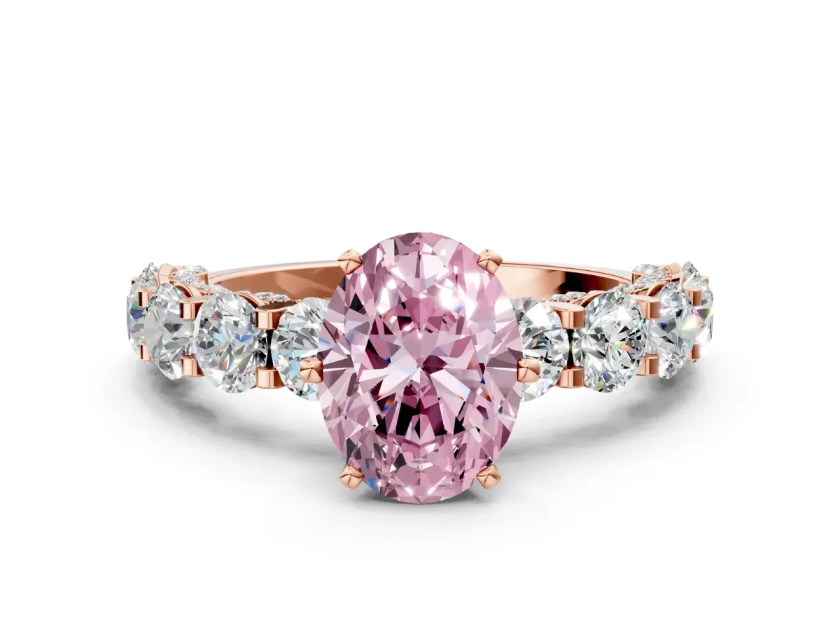Fancy Pink Oval Cut Diamond Side Stone Engagement Ring with Four-Prong Setting Rose gold