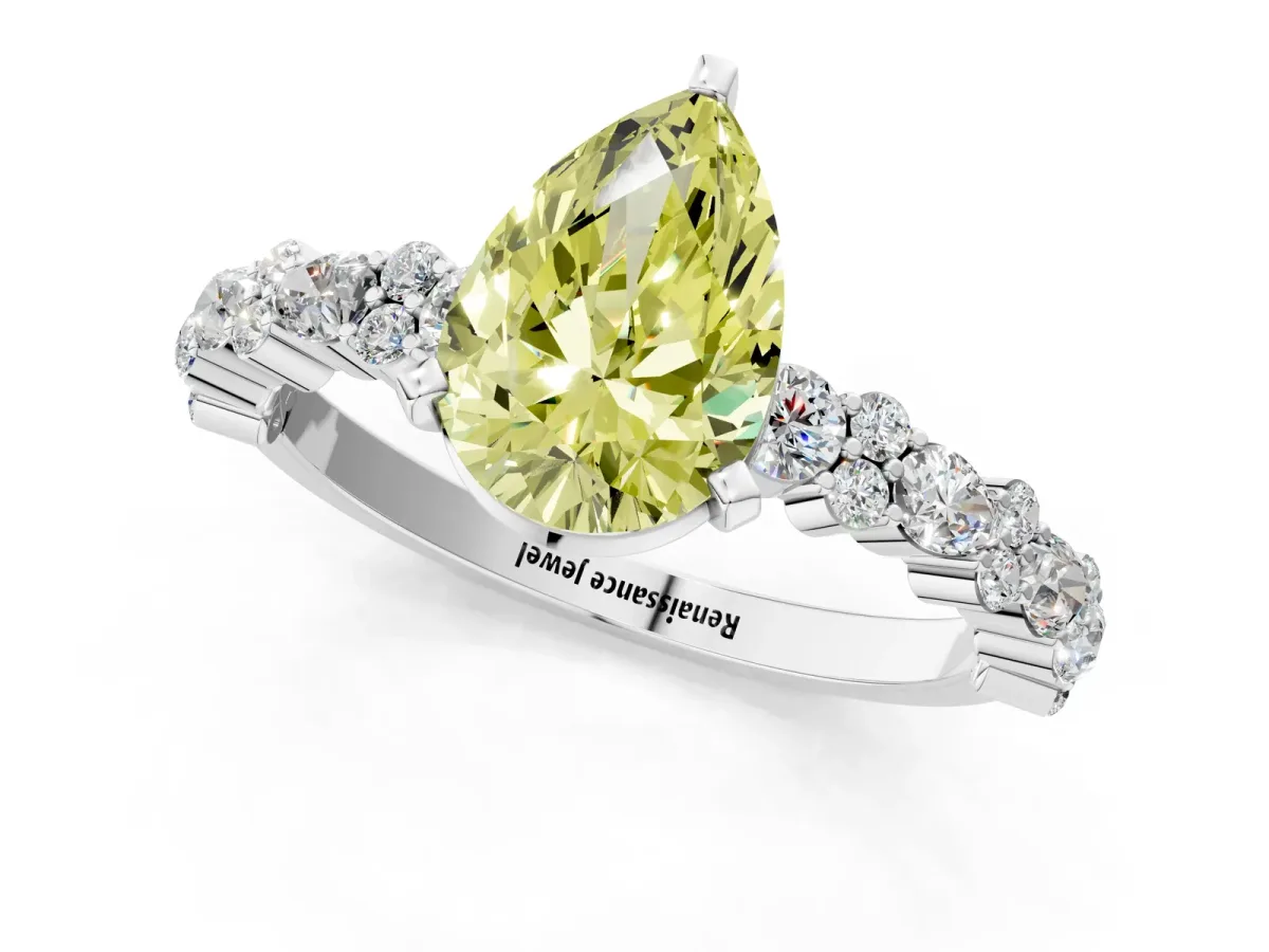 Fancy Yellow Pear Cut Diamond Side Stone Solitaire Ring with Round and Four-Prong Setting White gold