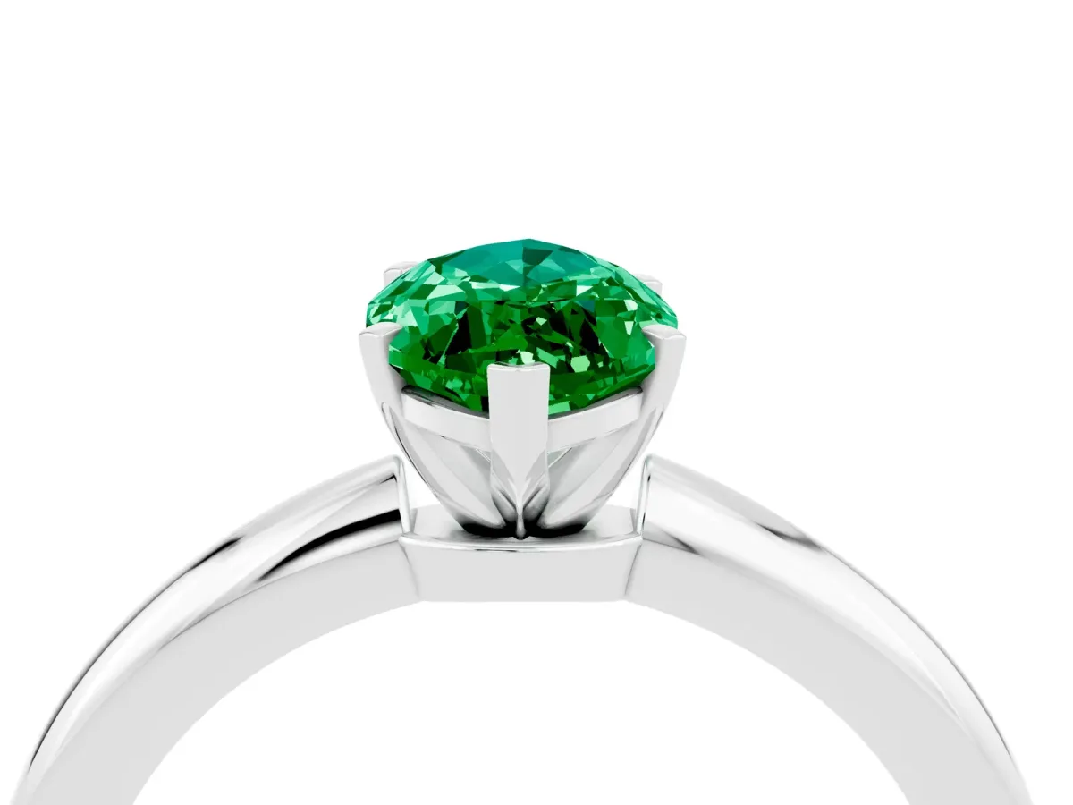 Marquise Cut Emerald Solitaire Ring with Six-Prong Setting and Classic Band Platinum