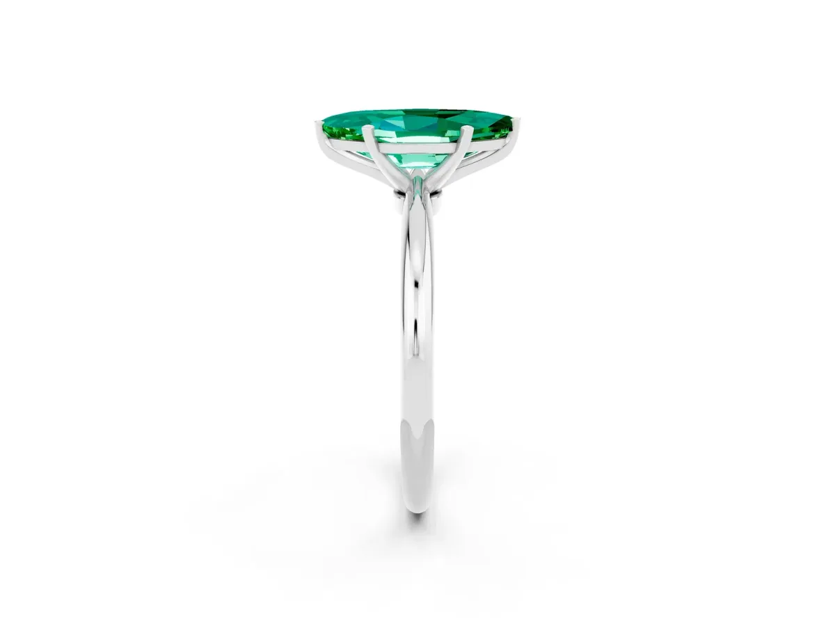 Marquise Cut Emerald Solitaire Ring with Six-Prong Setting and Classic Band Platinum