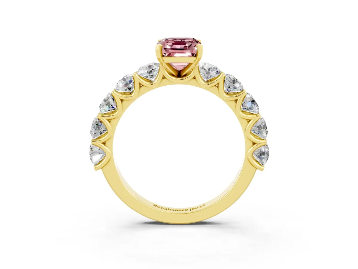 Emerald Cut Morganite Prong Setting with Side Stones on a Pave Band Yellow gold
