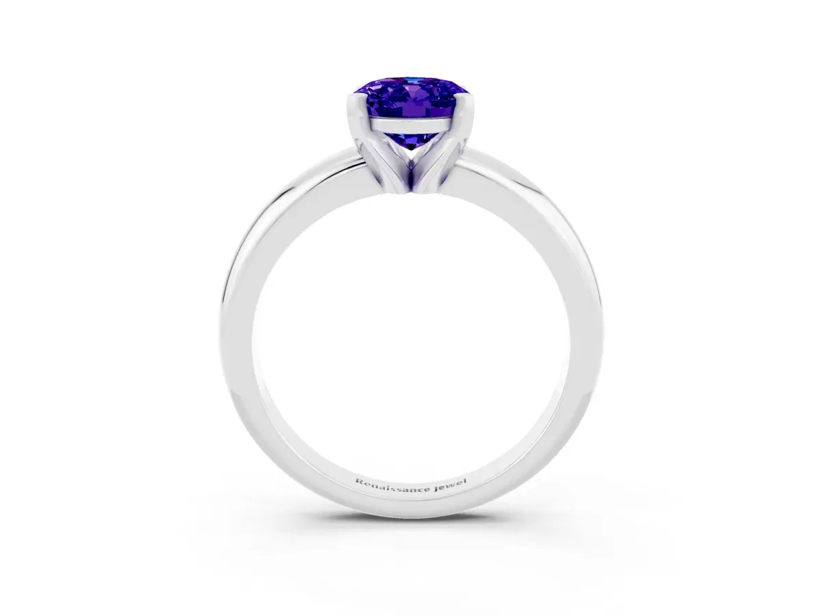 Oval Cut Tanzanite Solitaire Engagement Ring with Round Band and Four-Prong Setting Silver