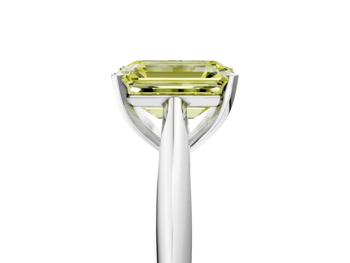 Fancy Yellow Emerald Cut Diamond Solitaire Engagement Ring with Cathedral Setting and Four-Prong Mount White gold
