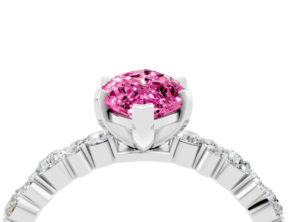 Marquise Cut Pink Sapphire Side Stone Solitaire Ring with Round and Four-Prong Setting Platinum