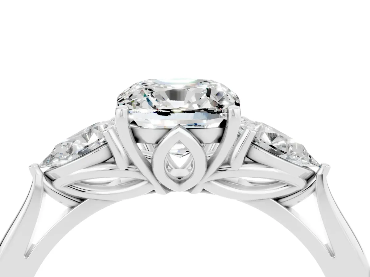 Three-Stone Cushion Cut Moissanite Ring with Pear Side Stones in Four-Prong Setting White gold