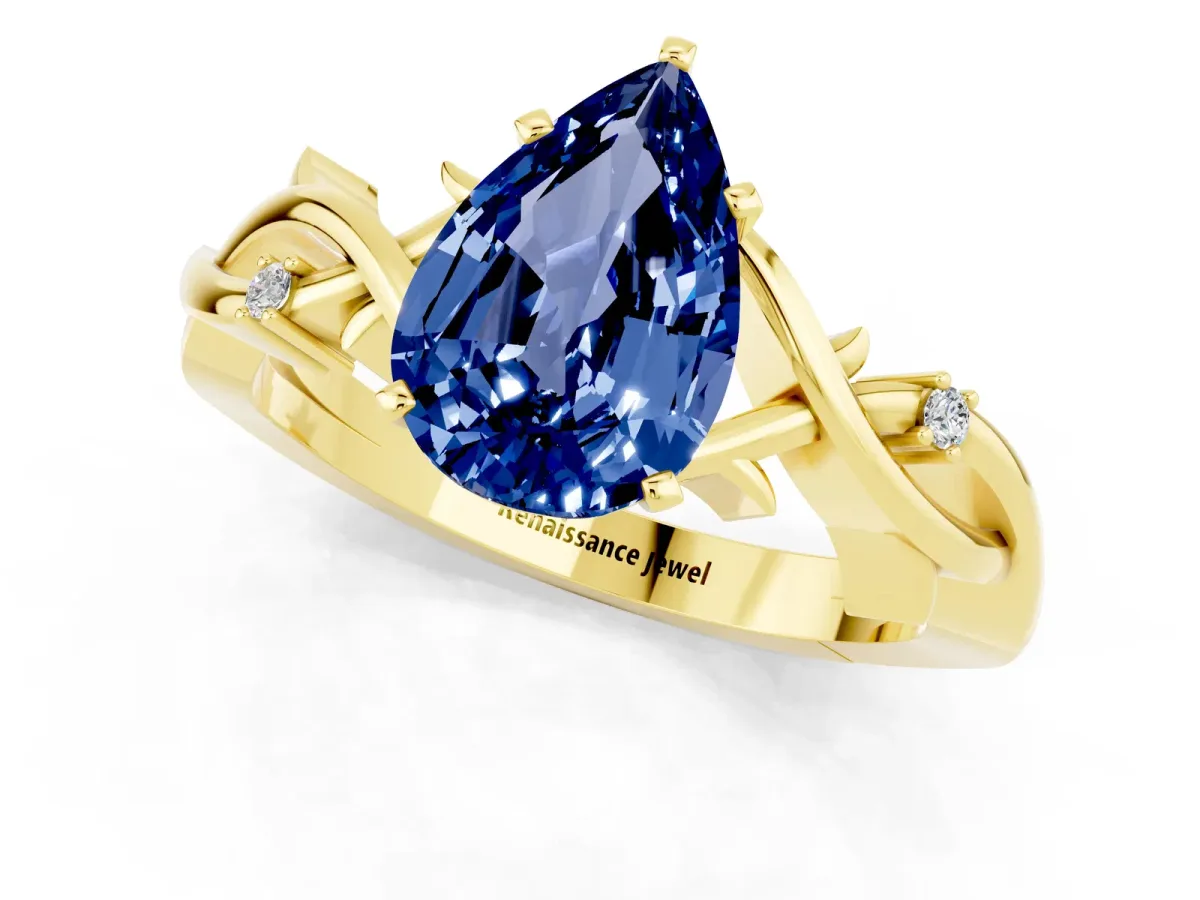 Pear Cut Blue Sapphire Solitaire Ring with Twisted Band and Prong Setting Yellow gold