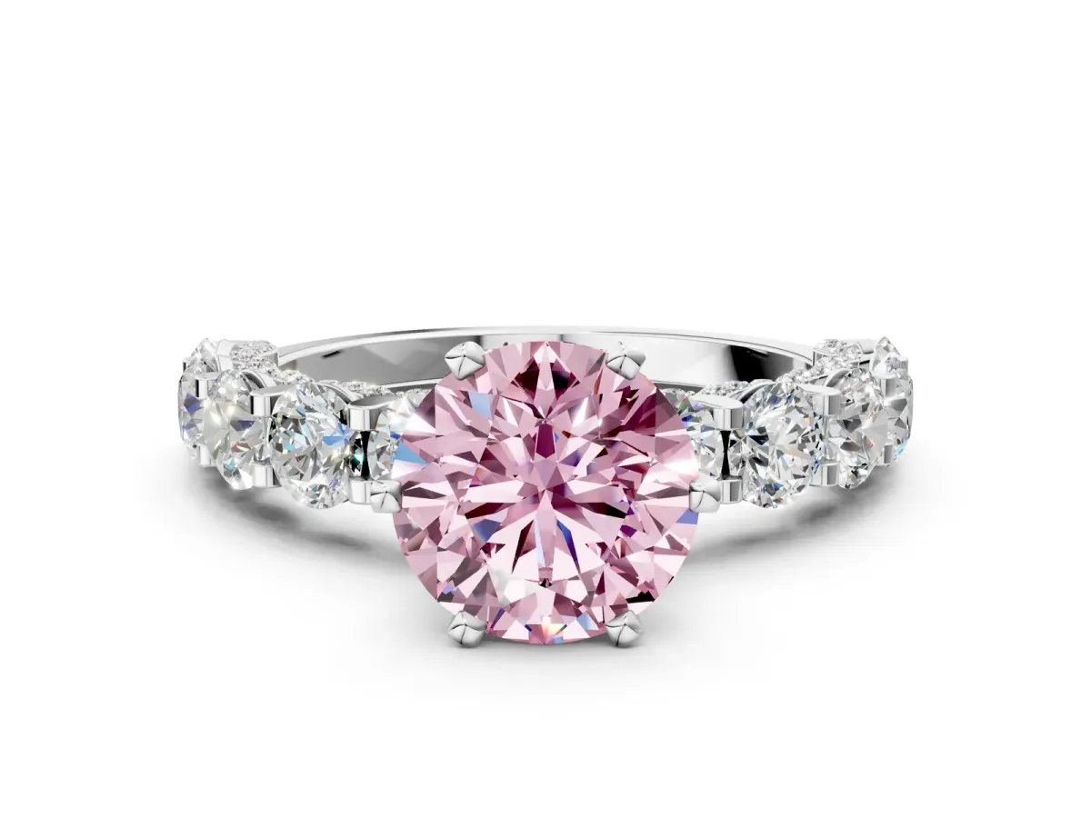 Fancy Pink Round Cut Diamond Side Stone Engagement Ring with Four-Prong Setting White gold
