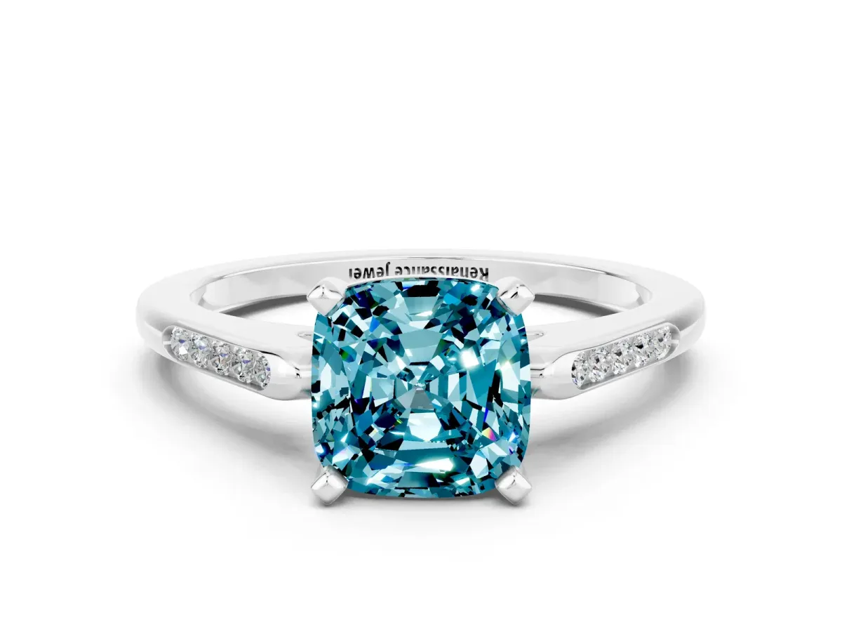 Cushion Cut Blue Topaz Solitaire Ring with Channel Set Round Band and Prong Setting Silver