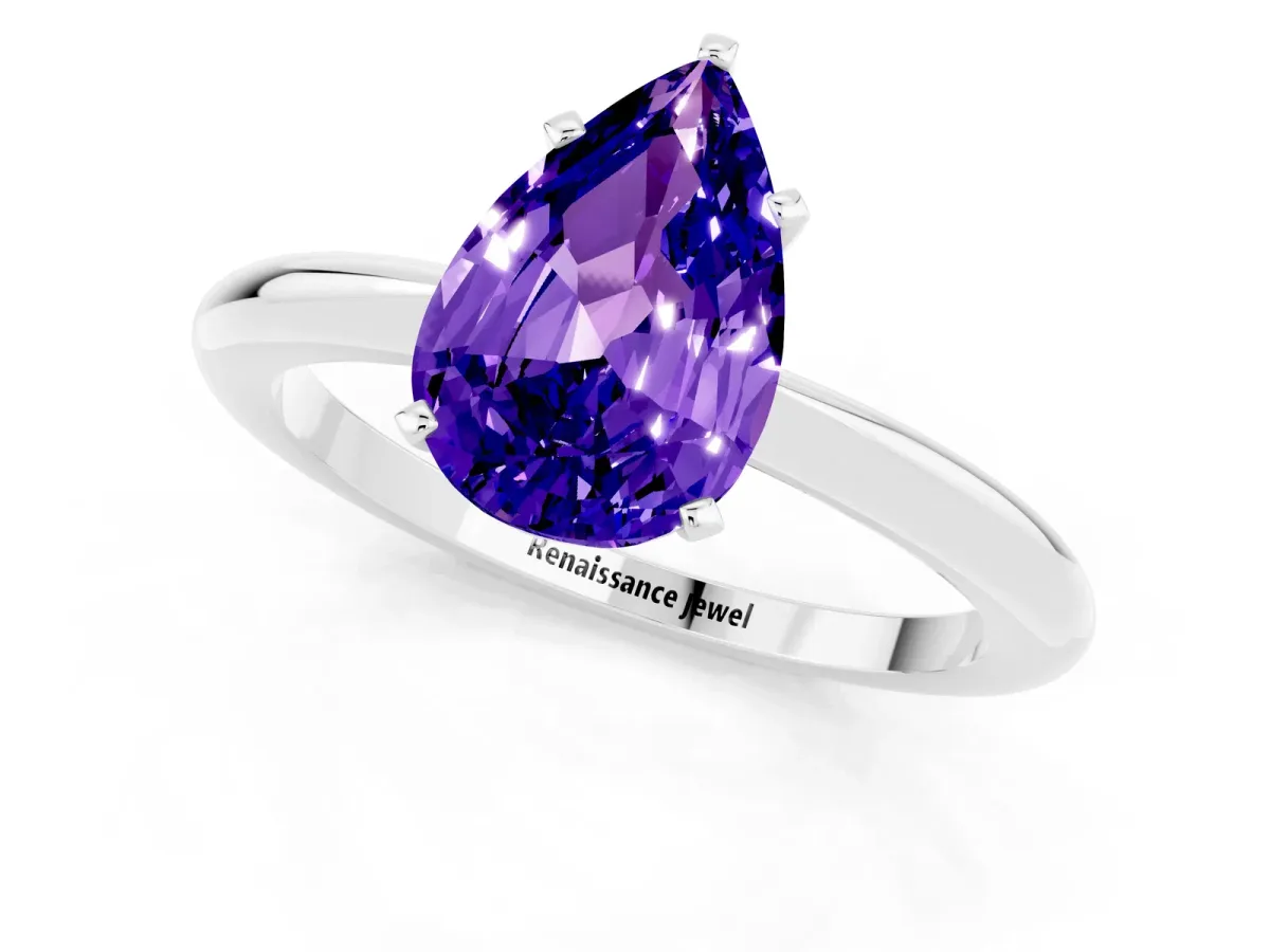 Pear Cut Tanzanite Solitaire Ring with Six-Prong Setting and Classic Band Silver
