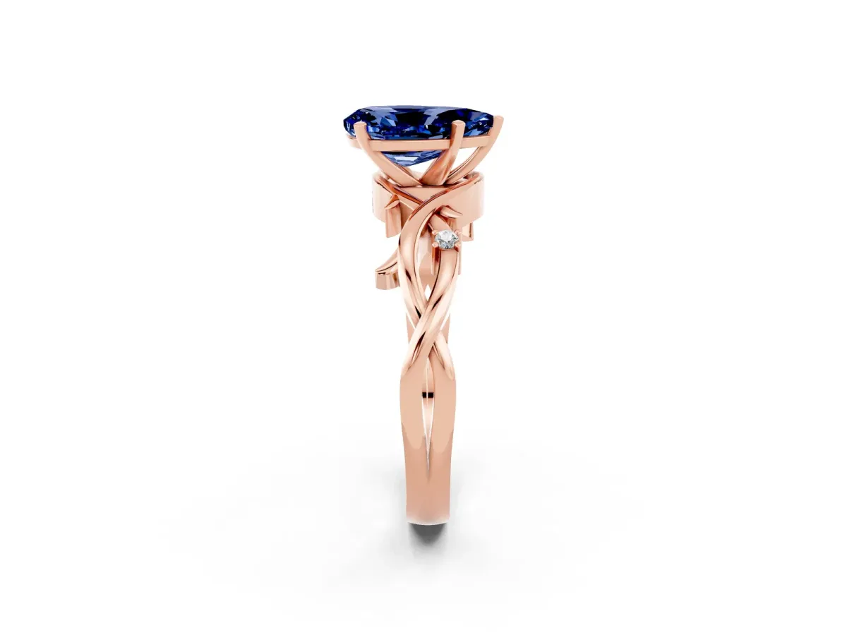Pear Cut Blue Sapphire Solitaire Ring with Twisted Band and Prong Setting Rose gold