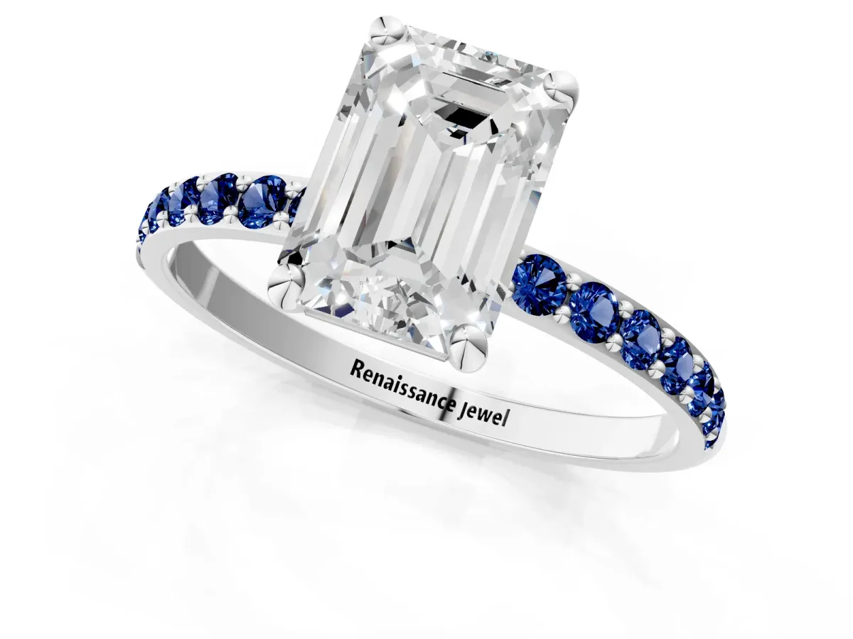 Emerald Cut Diamond Solitaire Ring with Round Blue Sapphire Pavé Band and Prong Setting Silver