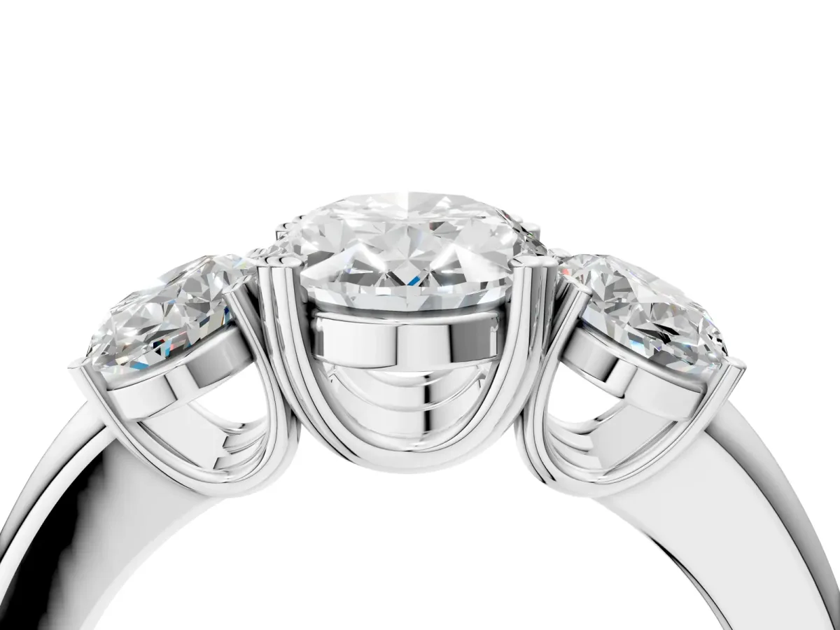 Three-Stone Oval Cut Cut Diamond Ring with Channel Set Band and Four-Prong Setting White gold