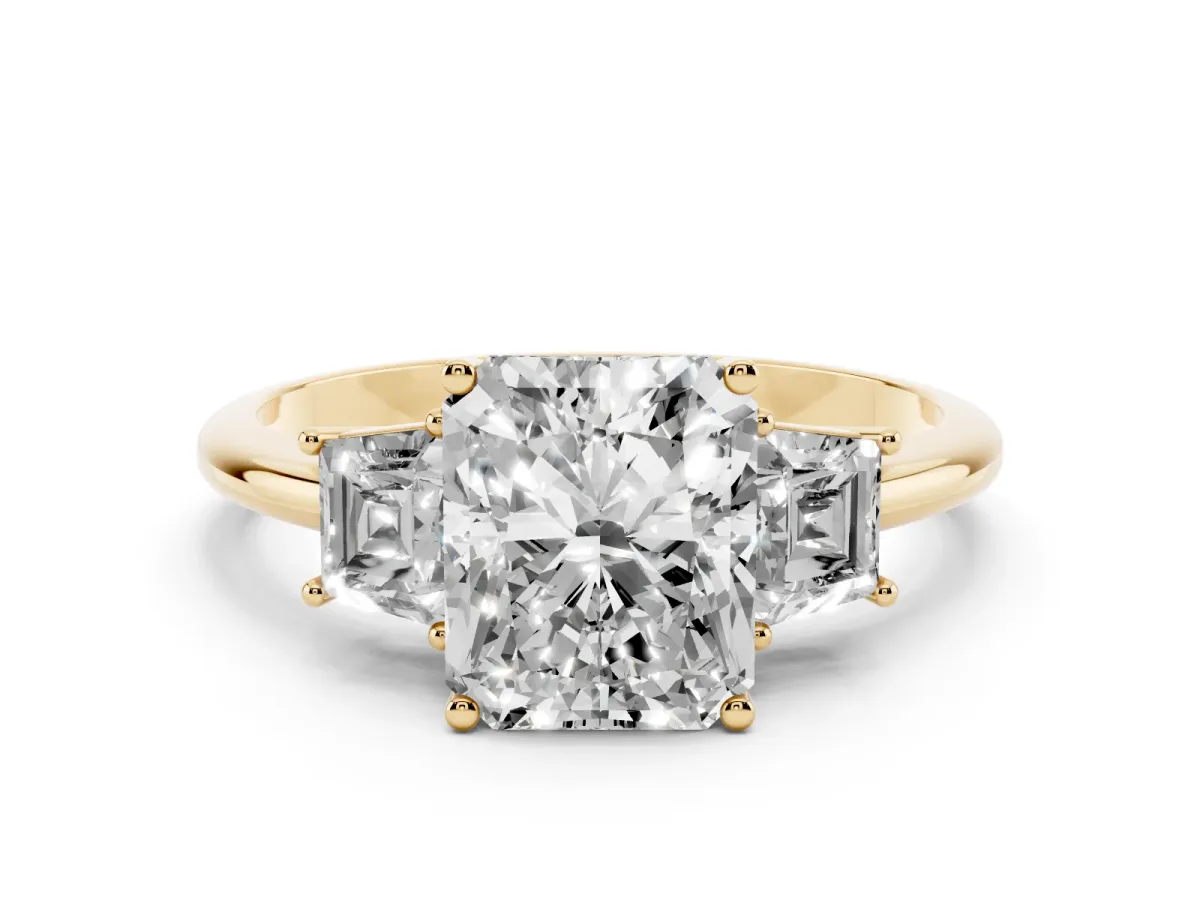 Radiant Cut Diamond Three-Stone Ring with Trapezoid Side Stones and Prong Setting Yellow gold
