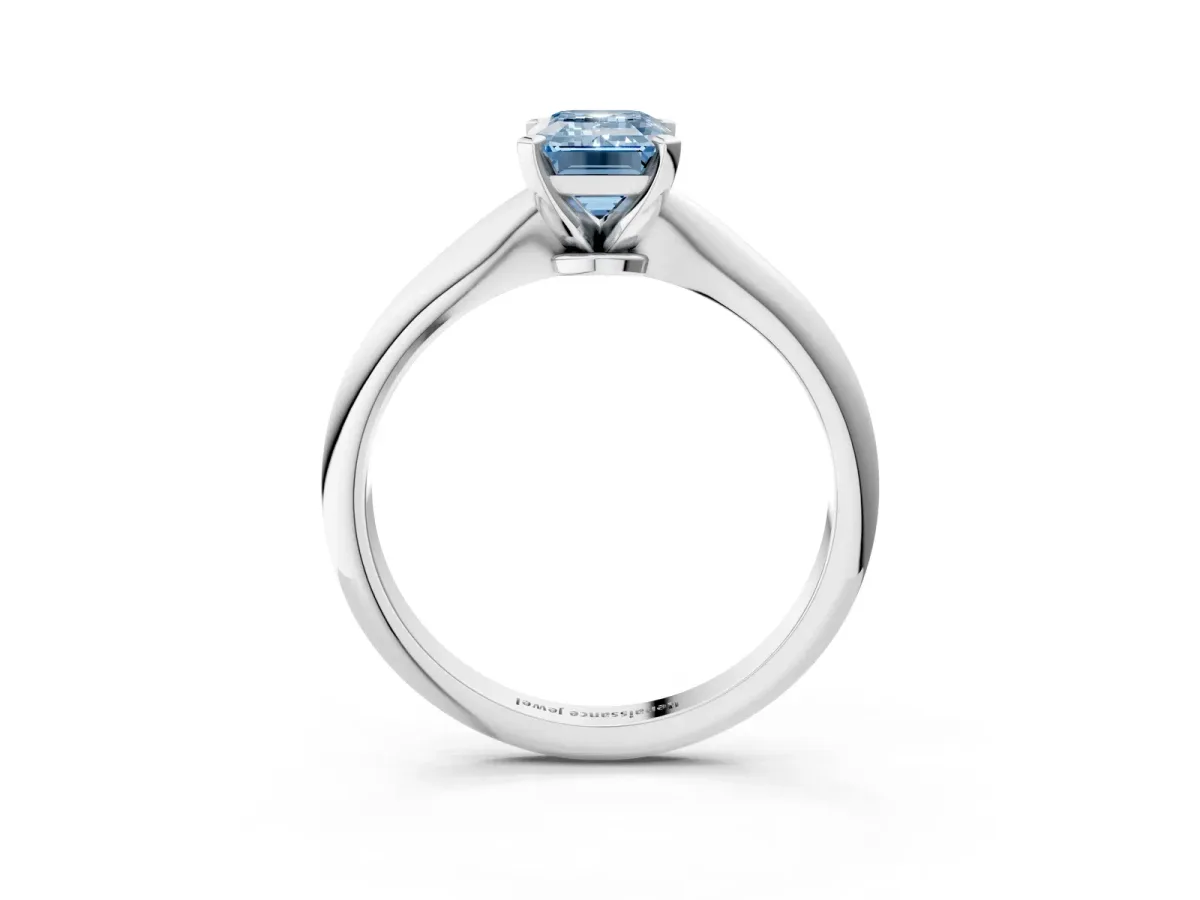 Fancy Blue Emerald Cut Diamond Solitaire Engagement Ring with Classic Band and Four-Prong Setting Silver