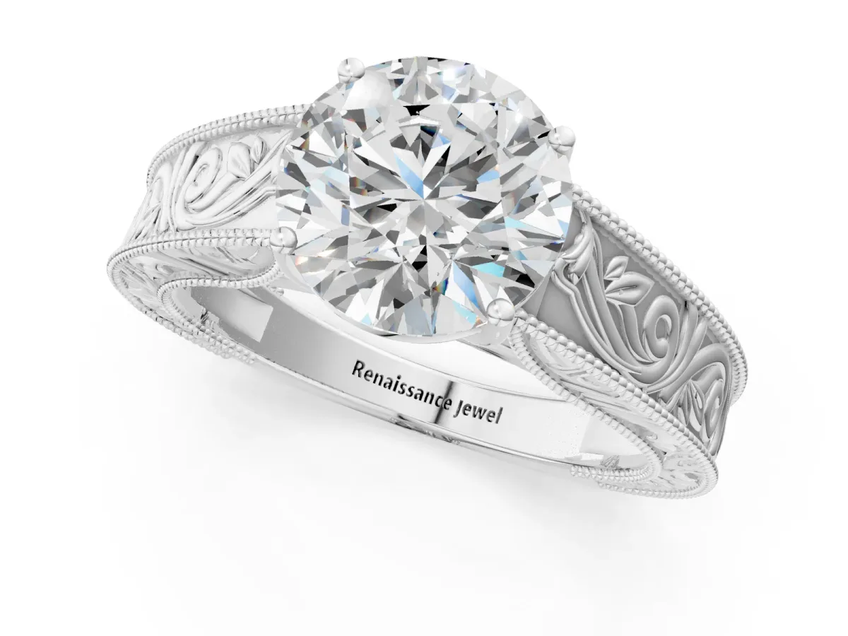 Round Cut Diamond Solitaire Ring with Engraved Band and Four-Prong Setting White gold