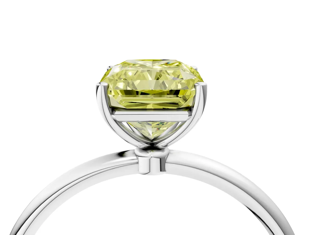 Fancy Yellow Radiant Cut Cut Solitaire Engagement Ring with Thin Band and Four-Prong Setting Platinum