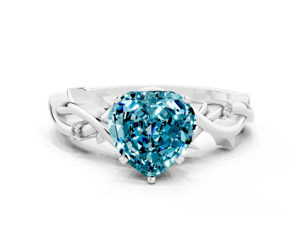 Heart Cut Blue Topaz Solitaire Ring with Twisted Band and Prong Setting Silver
