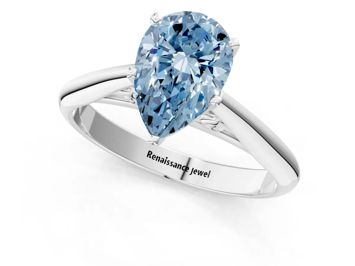 Fancy Blue Pear Cut Diamond Solitaire Engagement Ring with Cathedral Setting and Four-Prong Mount White gold