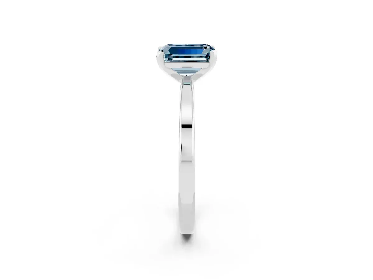 Emerald Cut Aquamarine Solitaire Engagement Ring with Classic Band and Four-Prong Setting Silver