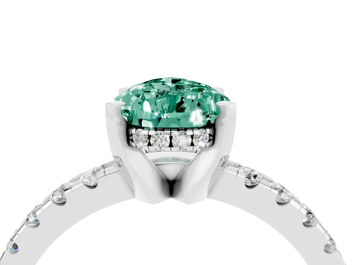 Pear Cut Green Sapphire Solitaire Ring with Round Pavé Band and Four-Prong Setting Silver
